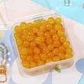 8mm yellow imitation jade glass beads for DIY jewelry making in a clear plastic box - Orange
