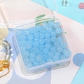 Light blue 8mm faux jade glass beads in a storage box for DIY jewelry making - Blue