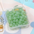 8mm light green translucent glass beads for DIY bracelets in a clear storage box - Green