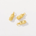 Three pieces of matte gold peanut pendants with Fu character for DIY jewelry making - Peanut
