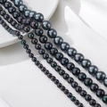 Gepolijste zwarte schelpparelstrengen in verschillende maten voor DIY-sieraden - Iriserend Zwart 6mm