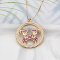 18k gold plated necklace featuring a round openwork pendant with twin girls and pink stones - NB06-5 18K Gold Plated Two Girls Colorful Zircon
