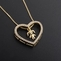 18k gold heart pendant necklace with girl charm and cubic zirconia on black texture - Gold Heart with Girl (Gold Plated)