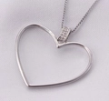 Elegant silver hollow heart pendant necklace with shimmering zircon stones and box chain - Silver Polished Hollow Heart Style