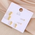 Trois paires de boucles d'oreilles dorées avec motifs ananas, arêtes et zircons sur carte - Ananas (EO12-5)