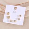 Coffret de boucles d'oreilles cœurs dorés avec trois paires en cristal et ajourées - Cœur (EO09-10)