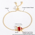 Adjustable gold bracelet featuring a red heart zircon pendant with a crown and sword design - Gold Plated Sword Through Heart (NC20-7)