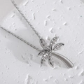 Collana con pendente a palma d'argento e zirconi su uno sfondo di pietra bianca - Albero di Cocco (NAA09-1)