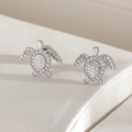 Silver sea turtle stud earrings featuring sparkling zircon pave settings and high polish - Sea Turtle Style(ER04-4) / Silver