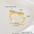 18k vergoldeter Kupfer-Schleifenring mit Zirkonia-Inlay, Breite 2,3 cm und Gewicht 3,04 g - US 7 / Gold