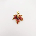 Golden maple leaf pendant featuring pear-shaped red gemstones and shimmering crystals - Maple Leaf Style (NAD09-1) / 3x2.5cm / Deep Red (NAD09-1)