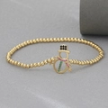 Detalle de pulsera de oro 18k con colgante de muñeco de nieve y circonitas de colores - Muñeco de Nieve de Navidad (NAG06-7)