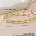 Golden stretch bracelet featuring striped copper beads and triple-layer gold plating - 6+3mm Pumpkin Bead Design (NAI02-1)