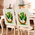 Detail of St. Patrick's Day chair covers with green clover and lucky horseshoe print - Horseshoe and Clover Print Style