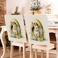 Detail of Easter bunny and egg print on faux linen chair covers in a home setting - Rabbit in Golden Egg Shell (TYTDR114-7)