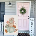 Detail view of Thanksgiving pumpkin garden flag hanging on a white wooden porch door - Hyqt51-30