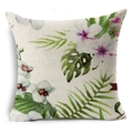 Detail shot of linen cushion cover showing tropical flower and green monstera leaf patterns - Butterfly Orchid And Tropical Leaf (YMD52-2) / 45x45cm