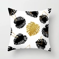 Detail showing gold foil monstera leaf and geometric triangle print on modern cushion cover - Gold Monstera Leaf Geometric Style (DRD377-11)