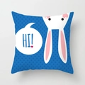 Blue Easter bunny pillow cover with dark blue polka dots and a cute cartoon rabbit design - Blue White Bunny Dialog (DRD65-14) / 18x18 Inch