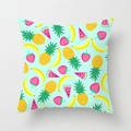 Square pillow cover with tropical fruit prints on a mint green fabric background - Cartoon Fruit Medley (DRD74-20)