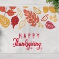 Linen placemat with Happy Thanksgiving text and colorful autumn leaf patterns - Happy Thanksgiving Leaves (CD12-9)