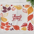 Autumn Thanksgiving table mat featuring colorful fallen leaves and red artistic lettering - Thanksgiving Foliage (CD12-10)