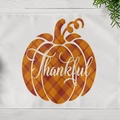 Linen placemat with orange buffalo plaid pumpkin and Thankful text on wood background - Thankful Buffalo Plaid Pumpkin (CD12-35)