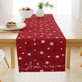 Close-up of Independence Day table runner with red stars and America script on wood - America Red Base Stars (ZQ13-8) / 33x183cm