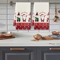 Dettaglio di asciugamani da cucina natalizi con Babbo Natale, gnomi e scritte festive - Motivo MJB01-22