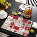Christmas snowman and Santa Claus patchwork dining placemat on a dark wooden table - Linen