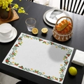 Christmas place mat with festive white base featuring green leaves and red berries print - Christmas Floral Border Style (CD60-10) / Linen