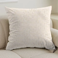Detailed close-up of cream throw pillow cover with colorful dots on a soft sofa - 45cmx45cm