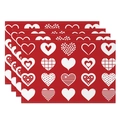 Detail of four red Valentine's Day placemats with white heart patterns and stitched edges - 30x45cm / All Red Multi Hearts (CDT09-30)