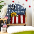 Detail of sunflower cushion cover with Freedom text and American flag style design - 25