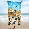 Microfiber beach towel with sea turtle print, unfolded on a beach setting with stars - Ocean Realistic Crawling Turtle (STMJ01-15)