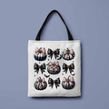 Detail of canvas tote bag with gothic Halloween pumpkin and pink bow graphic print - Nine Pumpkin Bows Grid (FBDT01-19)
