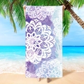 Microfiber beach towel featuring a purple watercolor mandala design on a sunny beach - Purple Mandala Print (STMJ03-1)