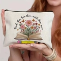 Close-up of canvas makeup bag with floral book print and Teach Love Grow quote - Growing Among Books Print (TSND25-15) / 21.5*15cm