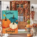 Fall garden flag with pumpkins and Gather text displayed on a decorated porch background - Tricolor Pumpkins with Wheat (HYQ92-14)