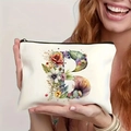 Close-up of cream canvas makeup bag with floral letter B and black zipper closure - Letter B (TSND27-2) / 21.5x15cm