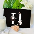 Detailed close-up of a black makeup bag with a floral letter H print and silver zipper - 21.5x15cm / Letter H (TSND30-H)