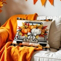 Detailansicht eines Herbst-Kissenbezugs aus Leinen mit Kürbis-LKW auf beige Sofa - Vintage Kürbis LKW (DYM382-4) / 45x45 cm