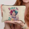 Borsa per trucco in tela beige con illustrazione Born To Sparkle nelle mani - Lino Fino / Born to Sparkle (THZB18-4)