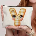 Close-up of canvas pouch featuring a cartoon letter Y with orange checkered pattern - 21.5x15cm