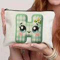 Close-up of canvas makeup bag with green checkered letter H and cute cartoon flower - 21.5x15cm / Alphabet H Style (TSND48-H)