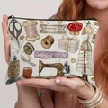 Detail of vintage sewing kit pattern on a beige canvas pouch held by a model - Retro Sewing Watercolor (TSND49-3) / 21.5*15cm