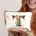 White canvas makeup bag with floral letter T print and black zipper closure - Letter T (TSND27-20) / 21.5x15cm