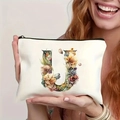 White canvas makeup bag featuring colorful floral letter U with black zipper closure - Letter U (TSND27-21) / 21.5x15cm