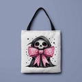 White canvas tote bag featuring cartoon skeleton reaper with a pink polka dot bow - Pink Bow Little Reaper (FBDT01-32)