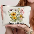 Crème canvas cosmetische tas met bloemenprint en de tekst Stay Hopeful erop - Stay Hopeful Aquarel Bloemen Stijl (TSND57-2)